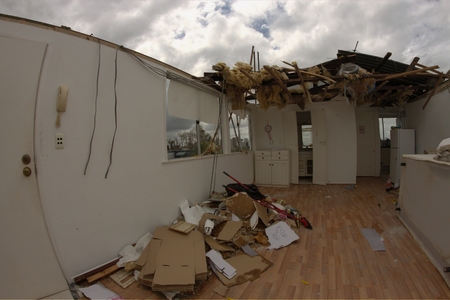 BRISBANE, AUSTRALIA - NOVEMBER 28 : Roof blown off unit from super cell hail storm area declared disaster on November 28, 2014 in Brisbane, Australiaのeditorial素材