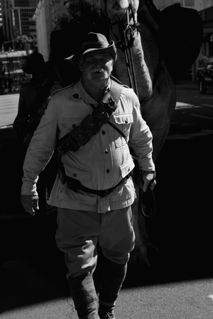 BRISBANE, AUSTRALIA - APRIL 25 : Reenactors march along the route during Anzac day centenary commemorations April 25, 2015 in Brisbane, Australiaのeditorial素材