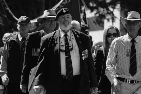 BRISBANE, AUSTRALIA - APRIL 25 : Veterans march along the route during Anzac day centenary commemorations April 25, 2015 in Brisbane, Australiaのeditorial素材