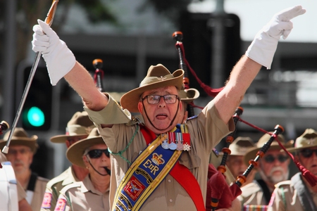 BRISBANE, AUSTRALIA - APRIL 25 : Military band performing along march during Anzac day centenary commemorations April 25, 2015 in Brisbane, Australiaのeditorial素材