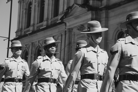 BRISBANE, AUSTRALIA - APRIL 25 : Soldiers march along the route during Anzac day centenary commemorations April 25, 2015 in Brisbane, Australiaのeditorial素材