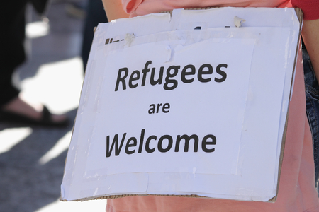 BRISBANE, AUSTRALIA - JUNE 20 : Sign suggesting ordinary Australians welcome refugess at World Refugee Day Rally June 20, 2015 in Brisbane, Australiaのeditorial素材