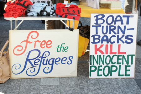 BRISBANE, AUSTRALIA - JUNE 20: Anti- immigration policy signs at World Refugee Day Rally June 20, 2015 in Brisbane, Australiaのeditorial素材