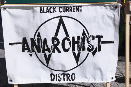 BRISBANE, AUSTRALIA - JUNE 20: Anarchist Banner at World Refugee Day Rally June 20, 2015 in Brisbane, Australiaのeditorial素材
