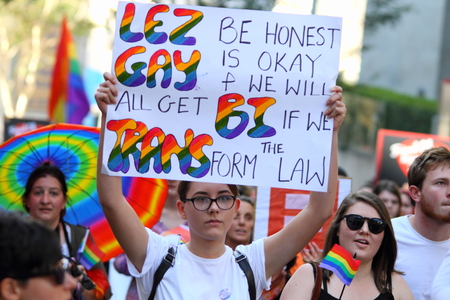 BRISBANE, AUSTRALIA - AUGUST 8 2015: Woman with pro equality sign at Marriage Equality Rally August...