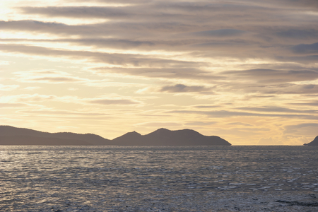 freycinet national park silhouetted  from spiky beach swansea tasmaniaの写真素材