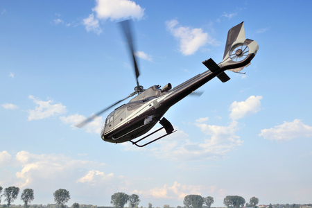 this picture shows a helicopter in flightの写真素材