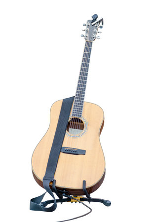 Vertical photo of an acoustic guitar on a white background.