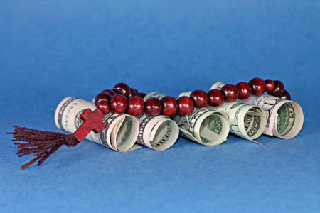 Donations of parishioners as successful business, on blue backdropの写真素材