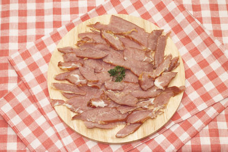 Delicious slices of meat on cutting board. Studio imageの写真素材