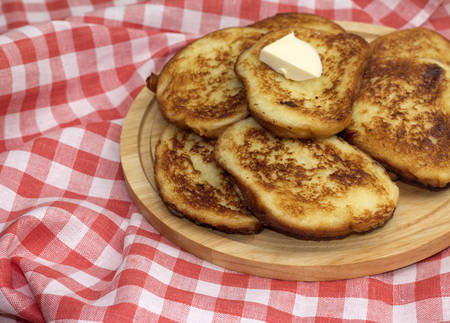 Delicious roasted toasts with slice of butterの写真素材