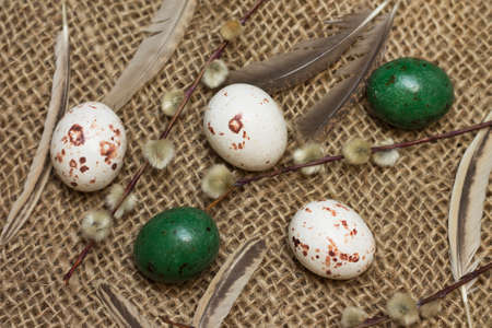 Easter. Chocolate sweets in form of colorful quail eggs, close-up