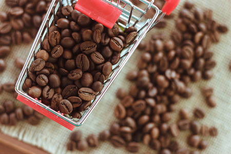 Studio image of coffee beans in a grocery trolleyの写真素材