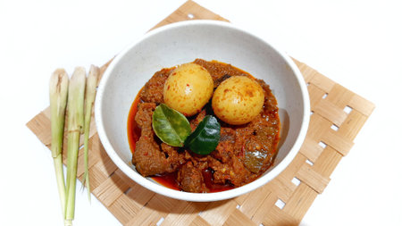 Beef Toppa Lada with eggs served in a white bowl. Popular Indonesian food from Makassar, South Sulawesiの写真素材