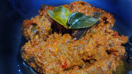 Beef Toppa Lada served in a black plate. Popular Indonesian food from Makassar, South Sulawesiの写真素材
