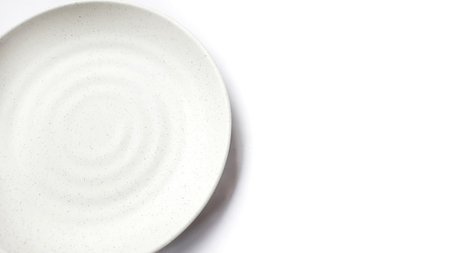 Empty circle white plate with ceramic melamin material isolated on white background