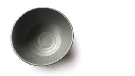 Empty bowl isolated on white background with clipping path. Top view.の写真素材