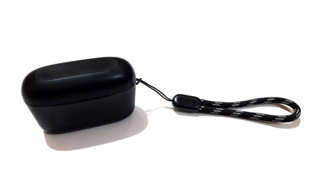 Black wireless bluetooth earbuds portable sound with fast charging case isolated on white background