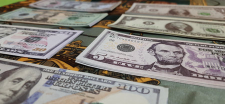 Close-up of dollar banknotes on a table. Business concept
