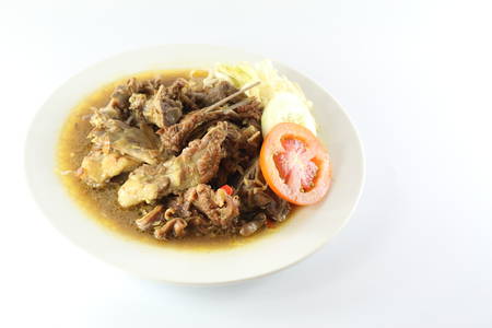 Meat soup and plateの写真素材