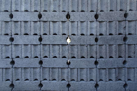 Texture of the concrete stone is arranged neatly so that it produces a hole in the middleの写真素材