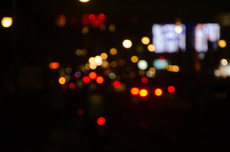 Night lights blur the background