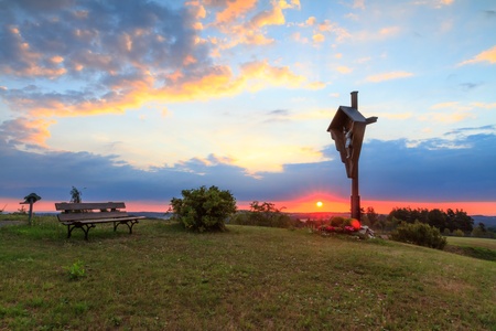 Christian Awakening at Mountain Marienberg  Landscape View on the cross at mountain Marienberg on a warm morning in Franconia, Germanyの写真素材