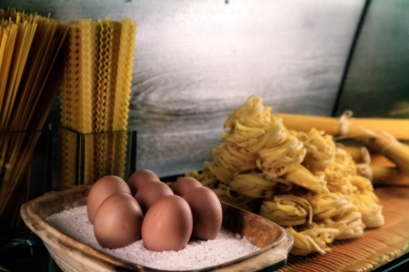 Italian Food  Pasta at a store in the lagoon city Venice in Italy, shot from the street の写真素材