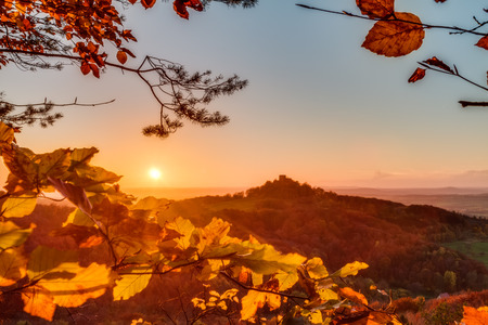 Lovely Autumn Landscape Panorama Picture of Northern Bavaria, Germany with colorful trees in the sunsetの写真素材