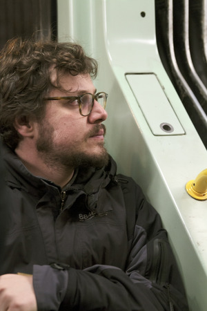 Editorial  ROME, ITALY - MARCH 25 2014  Young adult man on the Tram on MARCH 25 2014 in Rome in...