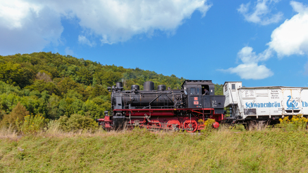 Historical 19th century Steam Locomotive at the Medieval Castle Ruin Neideck in the Franconian Swiss of Germany. In Bavaria north of Munichのeditorial素材
