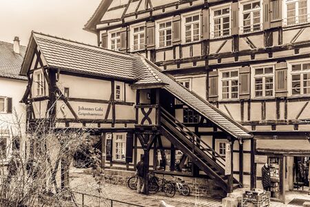 TUEBINGEN, GERMANY - JANUARY 20 2015: Tuebingen Old Town. Lovely Medieval Historical Houses. Vintage Black and White Sepiaのeditorial素材