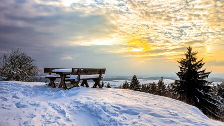 Cold snowy winter wonderland in the hills of the franconian Jura Region of Germany. Sweet Solitude. Cold and Lonely Landscape. Fantastic Lightの写真素材