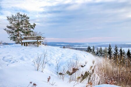 Cold snowy winter wonderland in the hills of the franconian Jura Region of Germany. Sweet Solitude. Cold and Lonely Landscape. Fantastic Lightの写真素材