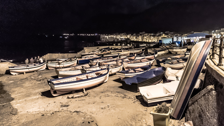 Lovely Picture of the Palermo coastline with boats at night on the beachの写真素材