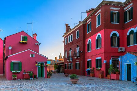BURANO, ITALY - SEPTEMBER 09 2013: Colorful Houses of Burano. Tourism Island in the Lagoon of Venice. Evening Atmosphere on a warm late summer dayのeditorial素材