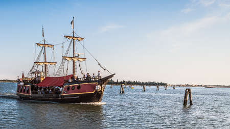 BURANO, ITALY - SEPTEMBER 09 2013: Wedding Ship in the Lagoon of Venice on a warm late summer eveningのeditorial素材