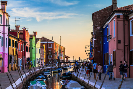 BURANO, ITALY - SEPTEMBER 09 2013: Colorful Houses of Burano. Tourism Island in the Lagoon of Venice. Evening Atmosphere on a warm late summer dayのeditorial素材