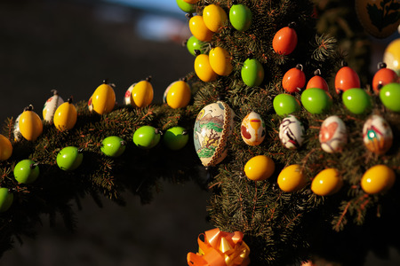Franconian Easter Tradition. Masterfully Colored Easter Eggs on a decorated Easter Well. Old german pagan spring ritual of well and water blessingの写真素材