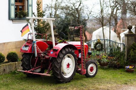Old Tractor in a franconian villageのeditorial素材