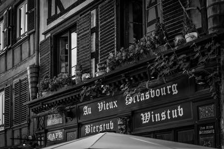 STRASBOURG FRANCE 16 MAY 2015: Historical european picturesque Town of Strasbourg France. Historical Half Timbered Houses. Old restaurant. Vintage Black and Whiteのeditorial素材