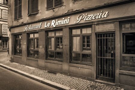 STRASBOURG FRANCE 16 MAY 2015: Historical european picturesque Town of Strasbourg France. Historical Half Timbered Houses. Old restaurant. Vintage Black and Whiteのeditorial素材
