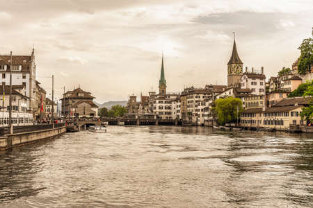ZURICH SWITZERLAND MAY 14 2015: Inner City of Zurich Switzerland. Old Town at the river. Vintage Sepia Colorのeditorial素材