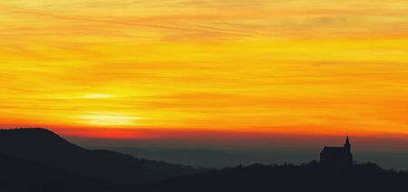 Lovely Silhouette Winter Landscape Panorama Picture of Northern Bavaria, Germany in the sunset