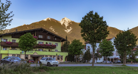SEEFELD, AUSTRIA - AUGUST 27 2015: Picturesque Tourist Olympia City Seefeld in Autria on a warm late summer eveningのeditorial素材