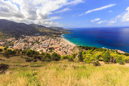 Fantastic Landscape at the italien sicilian Coastal City of Cefalu. Warm summer colors. Lovely sea and mediterranean historical houses. Lovely Sight and european travel destination in Italyの写真素材