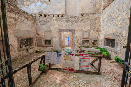 Mountain Fortress and Village of Erice on Sicily, Italy. Amazing medieval Mediterranean stone buildings and houses. Historical location and popular travel destination. Warm colors on a hot early autumn afternoonのeditorial素材