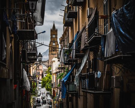 PALERMO, ITALY - OCTOBER 10 2015: Houses in the streets of Palermo on a cloudy and dramatic october dayのeditorial素材