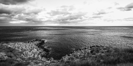 Dramatic Coast of Capo Gallo on Sicily in a Storm. Lovely landscape with many clouds in Sicily, Italy at the seaの写真素材