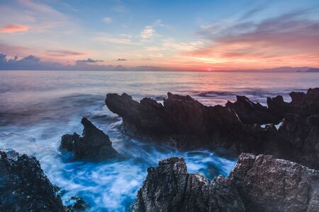 Sunrise over the Coast of Sicily. Dawn at Capo Gallo Coast near Palermo at Mondello on a warm autumn...